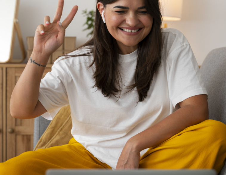 woman-having-video-call-home-laptop-device